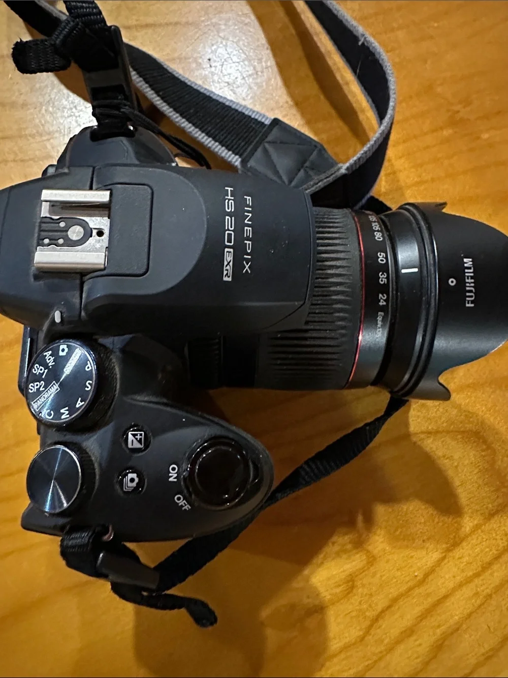 Fujifilm Black Camera Body with Black Lens and Red Trim